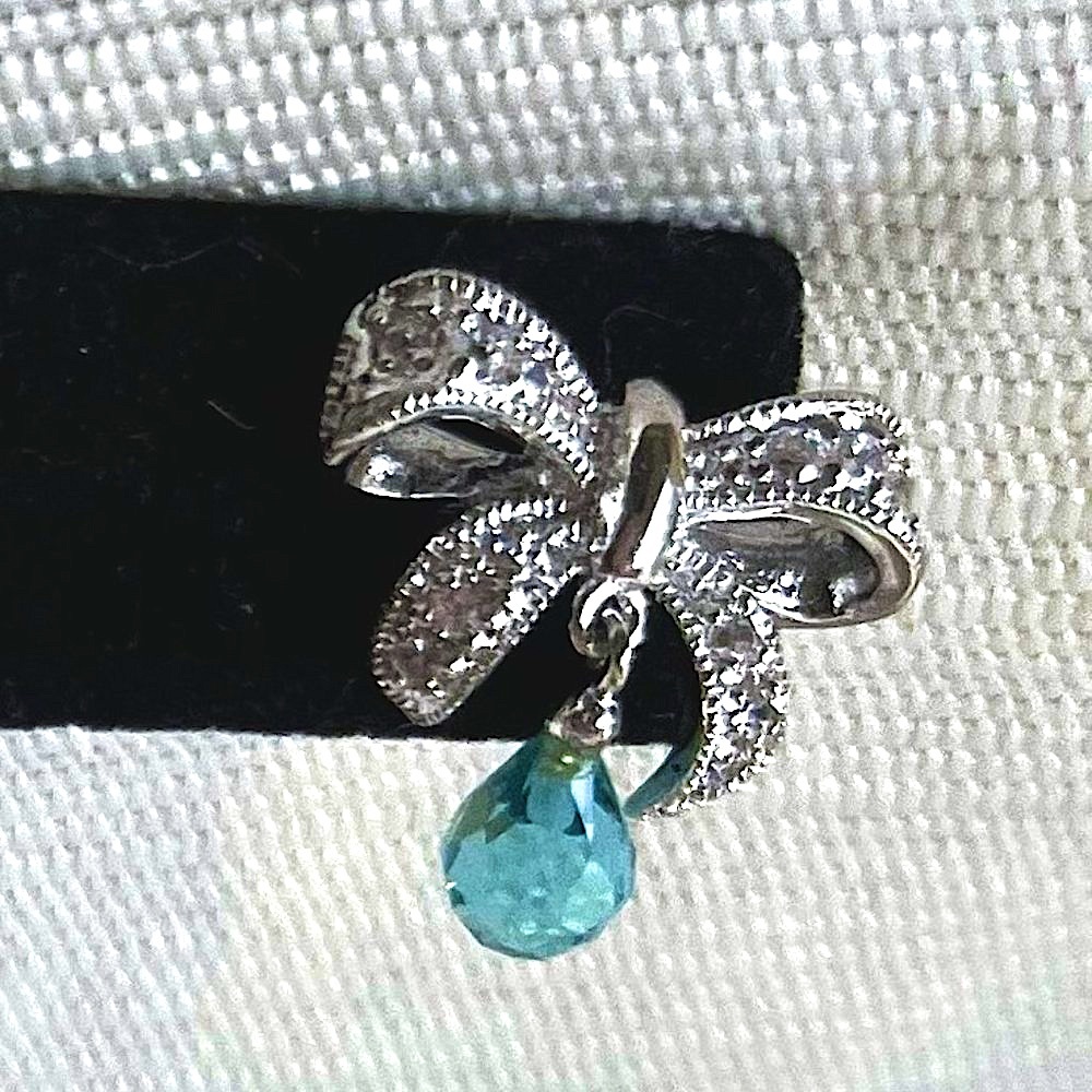 Silver Bows w Topaz Blue Faceted Teardrop Dangle Earrings